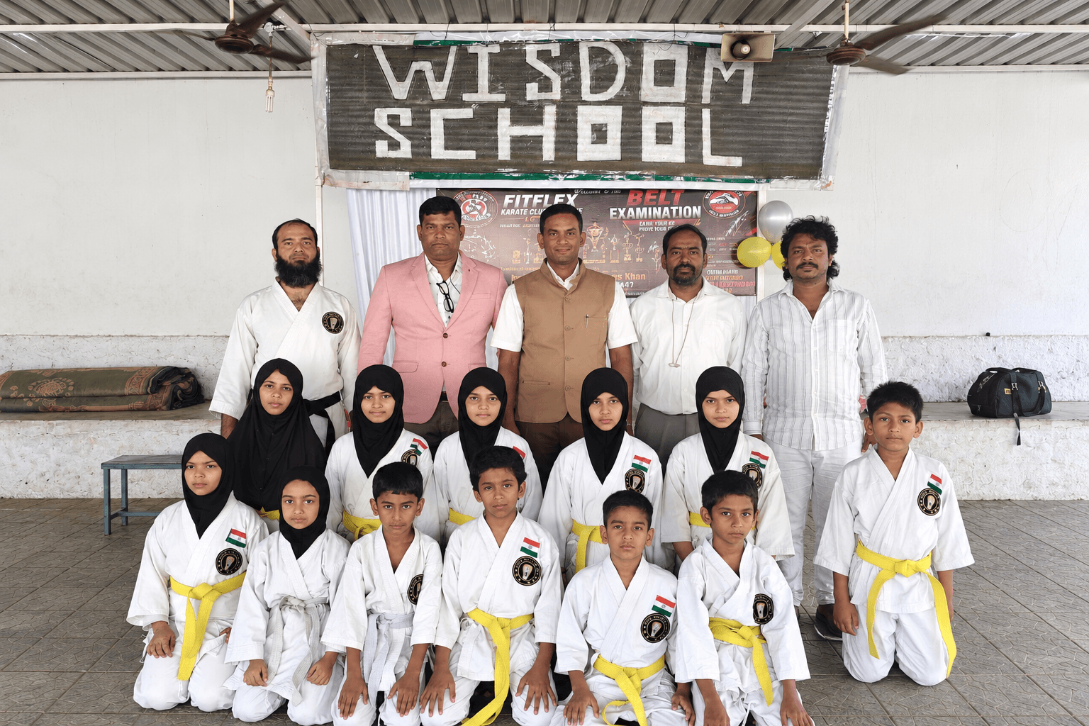 Students participating in a school activity at Wisdom School